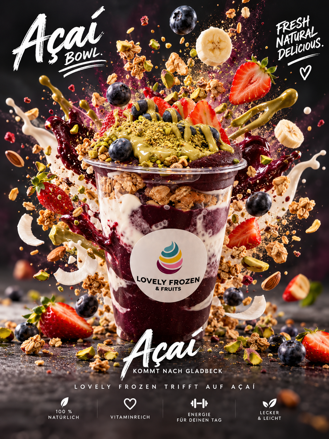 Açaí Bowl im Foodexplosion-Motiv mit schwebenden Früchten, Granola und Soße